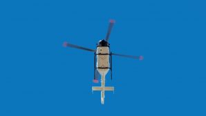 Вертолет приземлился на площадку больницы в Калкамане
